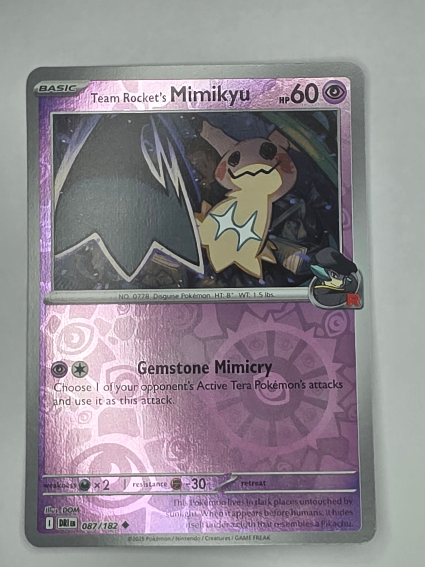 #087/182 Team Rocket's Mimikyu Reverse Holo